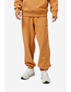 New Balance pantaloni de trening din bumbac culoarea portocaliu, uni