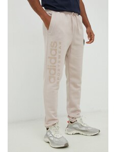 Adidas pantaloni de trening barbati, culoarea bej, cu imprimeu