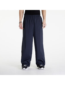 Pantaloni de nylon pentru bărbați Rains Naha Pants Wide UNISEX 47 Navy