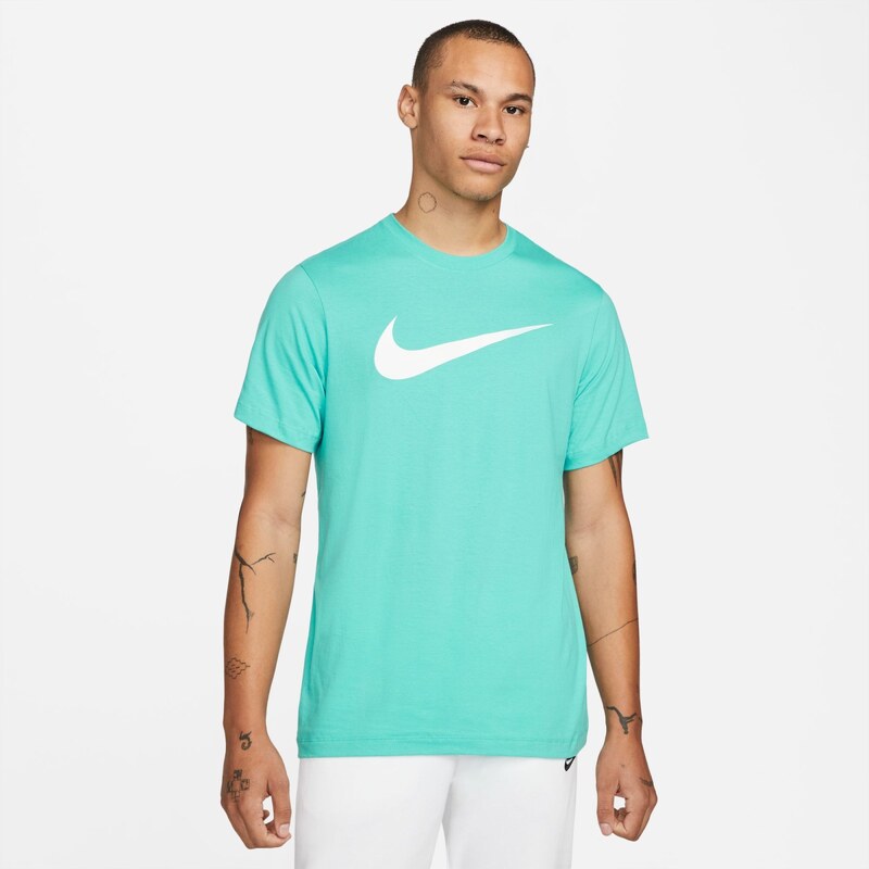 white nike shoes with teal swoosh