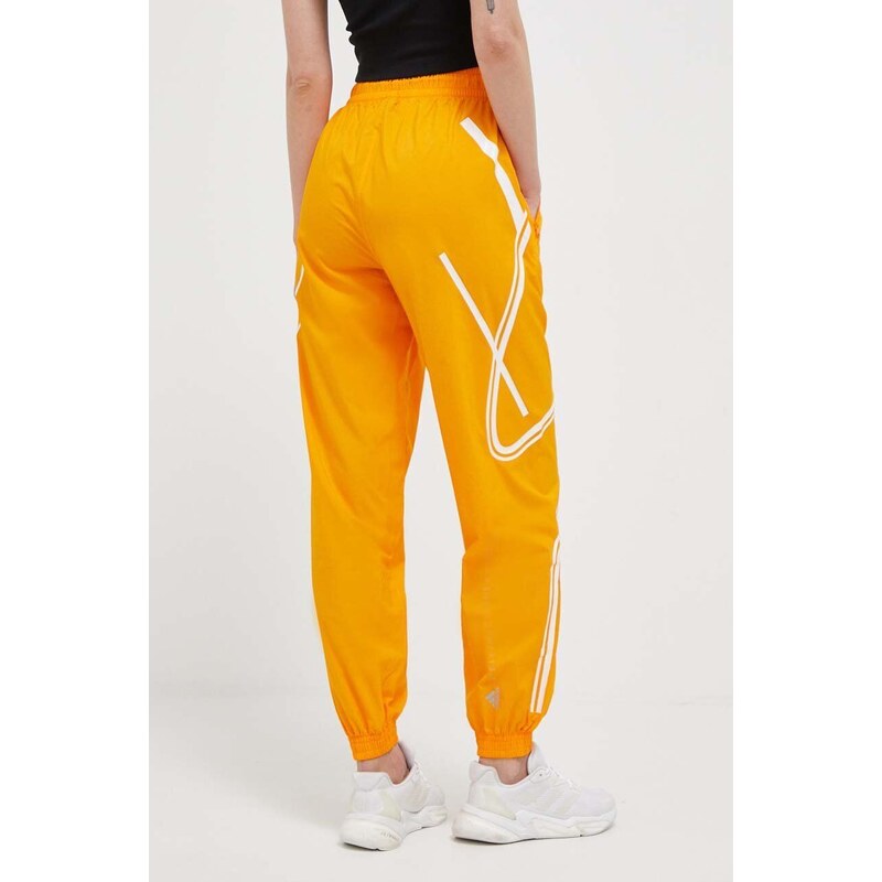 adidas by Stella McCartney pantaloni de antrenament TruePace culoarea portocaliu, cu imprimeu