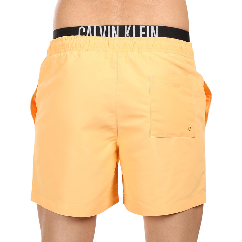 Costume de baie pentru bărbați Calvin Klein portocaliu (KM0KM00992-SAN) M