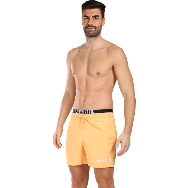 Costume de baie pentru bărbați Calvin Klein portocaliu (KM0KM00992-SAN) M