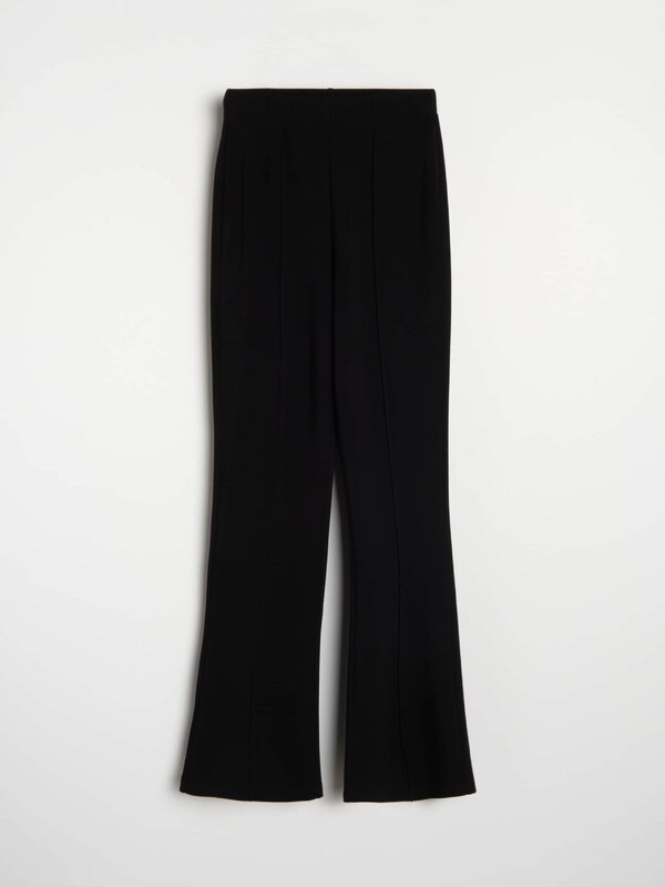 Sinsay - Pantaloni evazați din tricot cu cusături decorative - negru