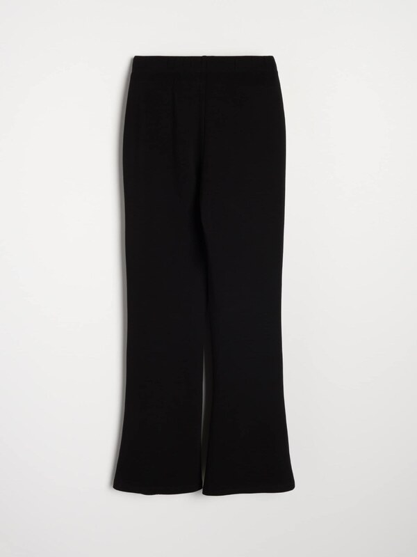 Sinsay - Pantaloni evazați din tricot cu cusături decorative - negru